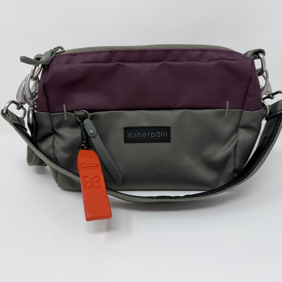 Sherpani Greenish Gray Purple Colorblock Crossbody Bag Logo Zipper Bag Charm - Picture 9 of 12